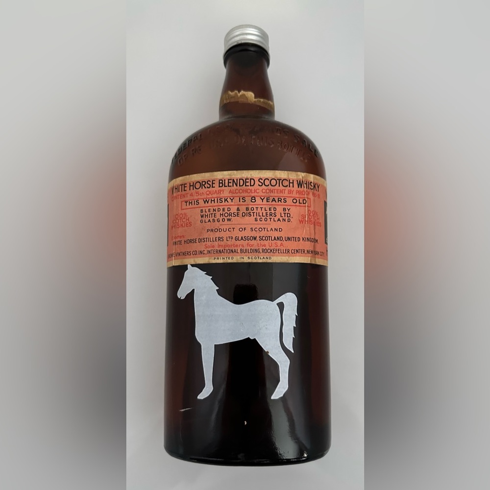 The White Horse Cellar Vintage Bottle
